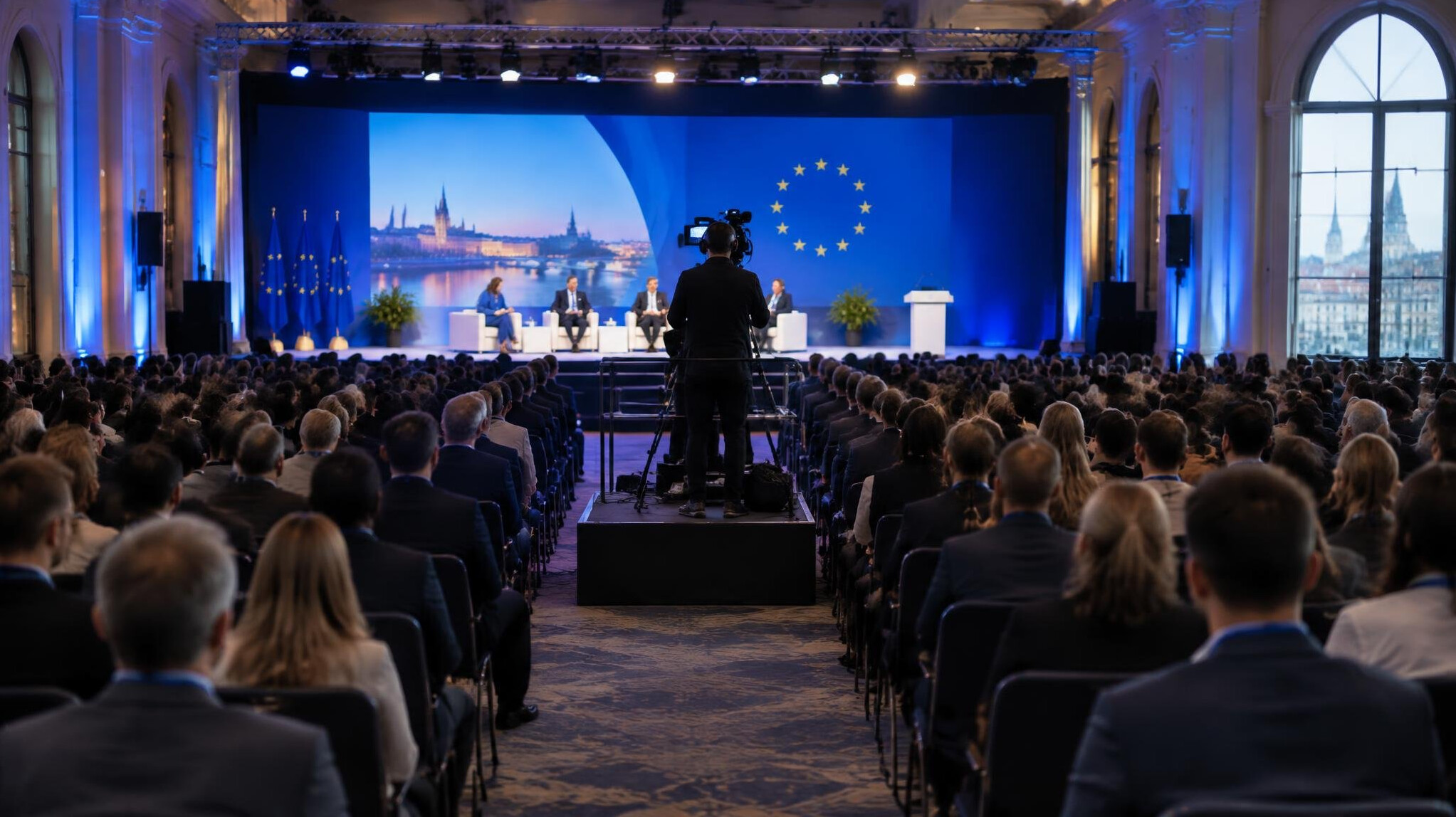 Conference hall with audience and stage lighting